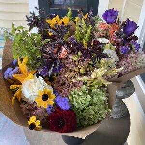 Fall bouquet with zinnia, rudbeckia, lisianthus, hydrangea, celosia, and more